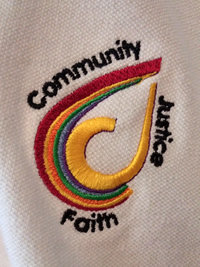 Close-up of embroidered logo on polo shirt