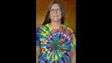 Colleen wearing tie dyed T-shirt