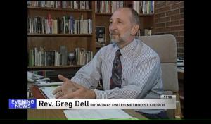 Greg Dell at desk in office at Broadway UMC.